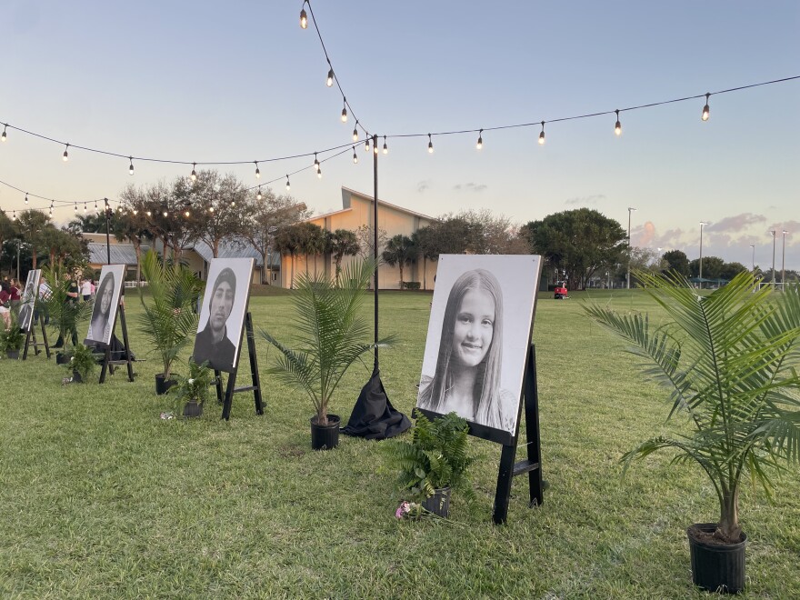 People stopped in front of the portraits in moments of reflection.