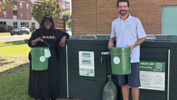 Jay Boone, executive director of KUSP, and Cameron Kania, CEO of Tidewater Compost, stand at a composting dropoff station at the Berkley Community Center in Norfolk on Sept. 9, 2026.
