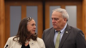 Rep. Suzanne Miles, the Republican caucus chair from Owensboro, talks with GOP Senate President Robert Stivers on the House floor as the legislative session picking up its pace.