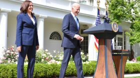 President Biden arrives with Vice President Harris to discuss the CDC's new mask guidance in the Rose Garden of the White House on Thursday.