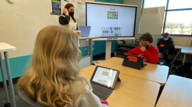 Sixth-graders in Eliza Williams' English class at Providence Day School work on Tuesday's Wordle.