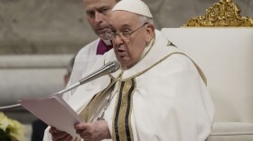 Pope Francis presides over Christmas eve Mass, at St. Peter's Basilica at the Vatican, Sunday Dec. 24, 2023.
