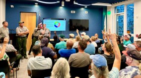 Ludric Smith, chief ranger at the Virgin Islands National Park, calls on attendees at a public meeting held Wednesday evening to discuss the proposed increase and expansion of amenity fees within the park.