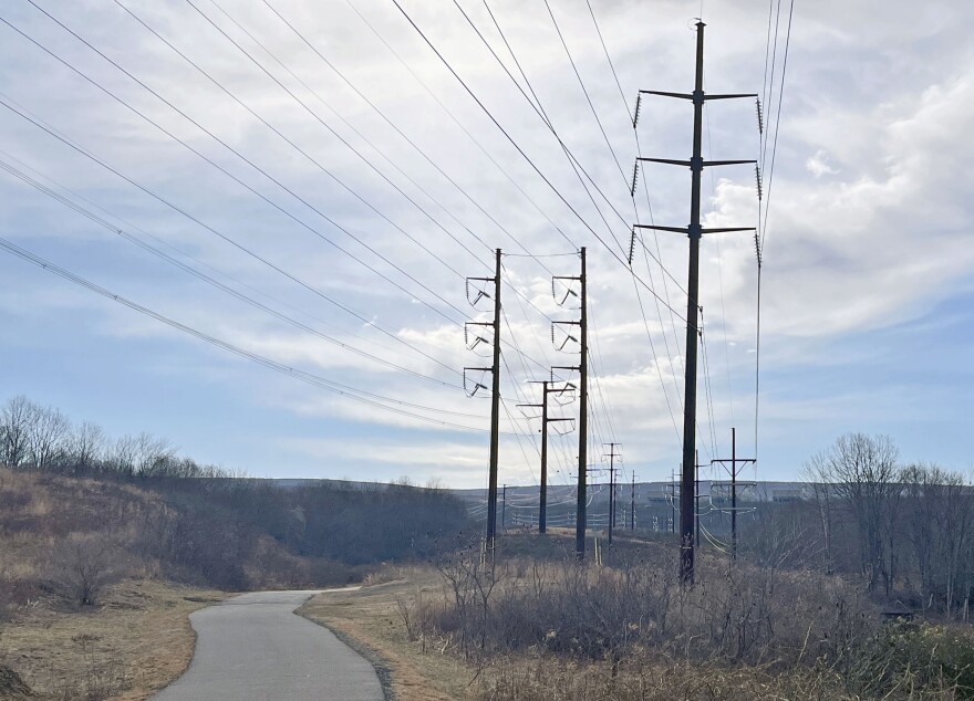 Power lines run along the Lackawanna River Heritage Trail in Lackawanna County.