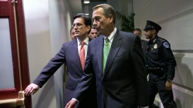 House Speaker John Boehner, R-Ohio (right), and Majority Leader Eric Cantor, R-Va., enter a Republican caucus meeting at the U.S. Capitol on Tuesday.