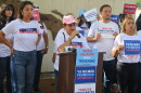 Martha Cabrera (speaker at podium), a longtime resident of the district and a former registered Republican voter, said she changed her voter registration to Non-Party Affiliated after feeling deceived by U.S. Rep. Maria Elvira Salazar’s promises. She spoke at a rally on Thursday, October 29, 2026, in Little Havana.