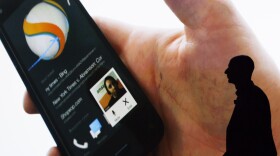 Amazon founder and CEO Jeff Bezos presents the company's first smartphone, the Fire Phone in Seattle on Wednesday.