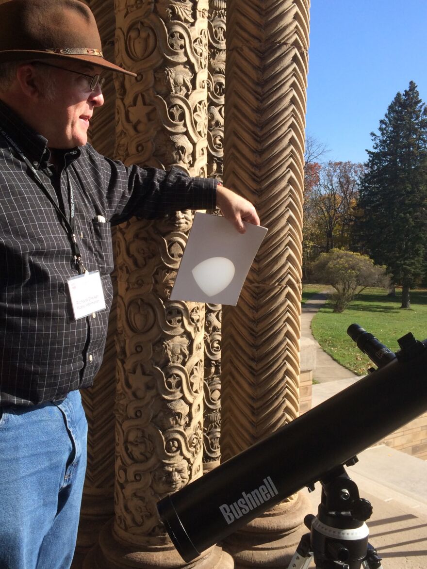 A tour guide shows a sun spot at the Yerkes Observatory.