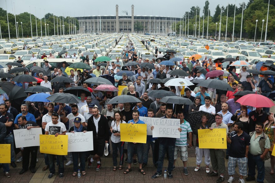 About 1,000 taxi drivers were expected during the protest Wednesday in Berlin. Here, demonstrators gather near Olympia Stadium.