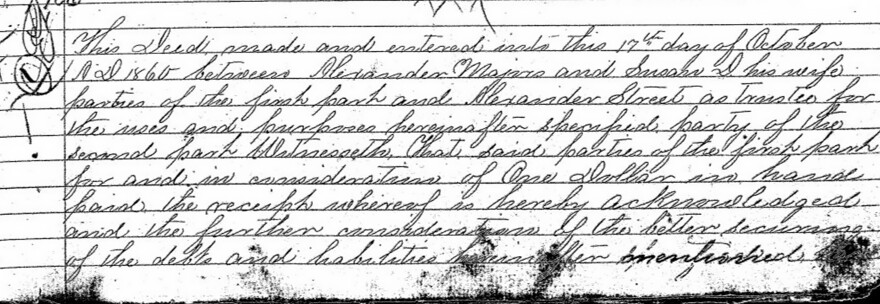 An excerpt from a deed of trust between Alexander Majors and Alexander Street as security for debt owed. The document includes thousands of acres of land in Jackson County, Missouri and Johnson County, Kansas, personal property, and nine enslaved people.