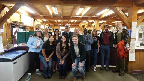 A group photo of Commissioner Ashley Randle with the employees of Flayvors of Cook Farm