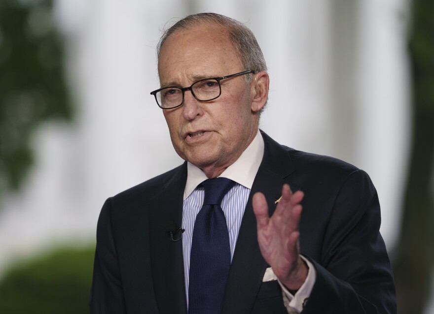 White House chief economic adviser Larry Kudlow speaks during a television interview outside the West Wing of the White House on May 18. President Trump tweeted that Kudlow suffered a heart attack and is hospitalized at Walter Reed Medical Center.