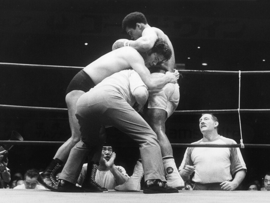 Heavyweight boxer Muhammad Ali fighting the champion Japanese wrestler Antonio Inoki at Budokan Hall in Tokyo in 1976.