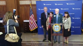 Lexington Mayor Linda Gorton, second from left, was joined by, from left, former mayors Scotty Baesler, James Amato and Theresa Isaac for a 50th anniversary celebration of the merger of Lexington and Fayette County governments.