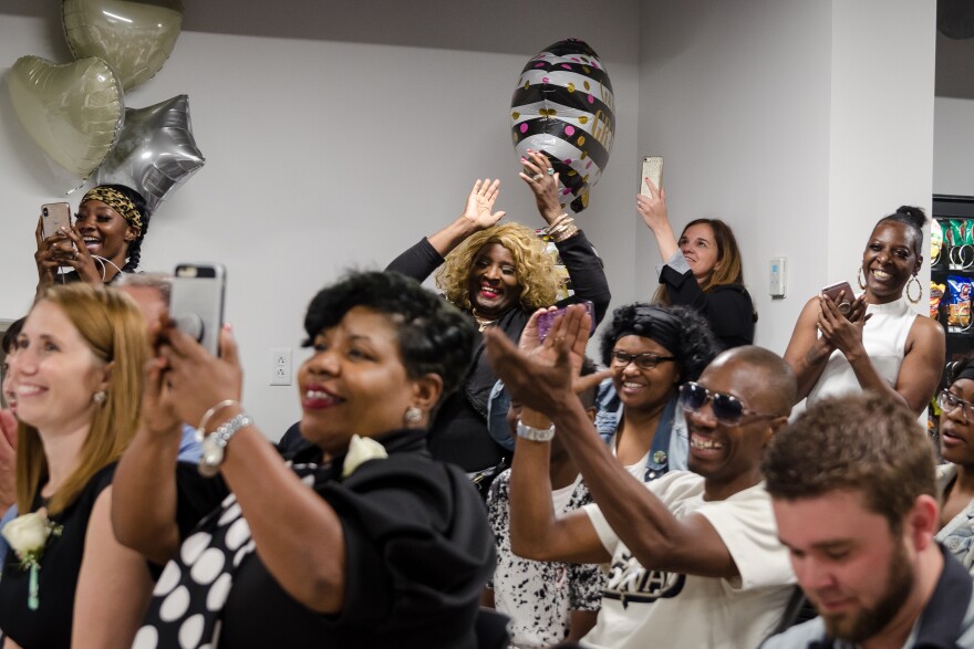 Family and MERS Goodwill staff cheer on graduates from a new adult high school program run by the non-profit May 29, 2019. About 500,000 Missourians lack a high school diploma.