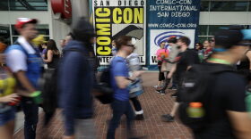 People arrive for the first day of Comic-Con Thursday, July 20, 2017, in San Diego. Comic-Con, which started as a comic-book convention with 300 participants in 1970 and has grown into a corporate-heavy media showcase that draws more than 130,000 attendees, runs through Sunday in San Diego. (Gregory Bull/AP)