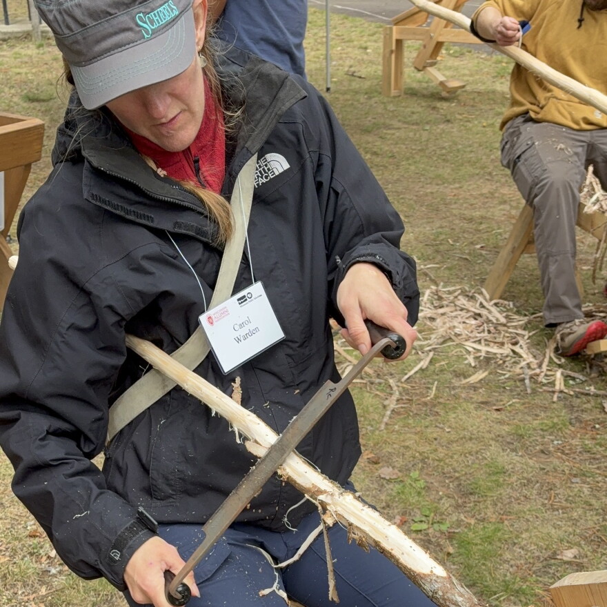 Carving a push pole.