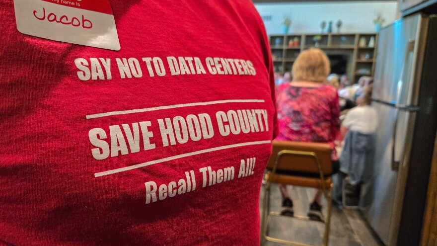 Hood County resident Jacob Herbold wears a shirt advocating for the protection of the county during the town hall session.