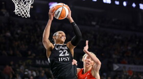 Las Vegas Aces center A'ja Wilson (22) pulls down a rebound by Indiana Fever guard Lexie Hull (10) during the first half in Game 3 of an WNBA basketball first-round playoff series Thursday, Oct.1, 2026, in Las Vegas. (AP Photo/Steve Marcus)