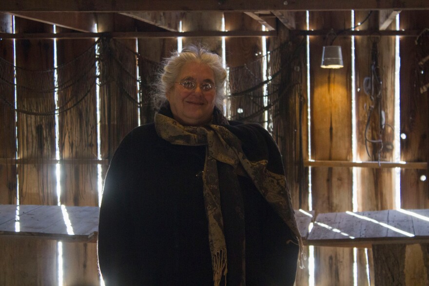 Elizabeth Garst, pictured at Whiterock Conservancy in a barn converted to a dance hall in the 1920s, is convinced that modern, conventional agriculture can become sustainable, but farmers gain will have to embrace.