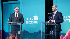 Democrat Secretary of State Adrian Fontes, left, argues Wednesday night with Republican challenger Alexander Kolodin.