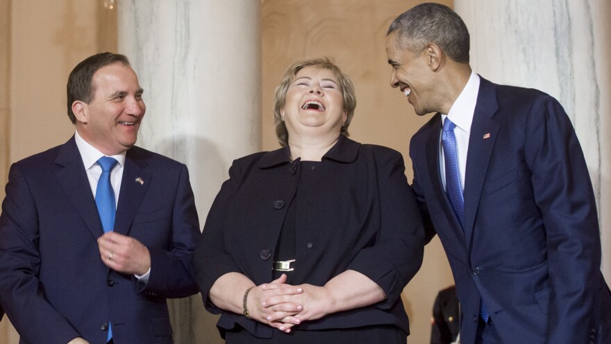 President Obama laughs alongside Prime Minister Erna Solberg of Norway, and Prime Minister Stefan Lofven of Sweden, during a State Arrival ceremony for Nordic countries. As happy as Solberg looks here, she's probably happier now that she has Pokémon Go to entertain her during parliament meetings.