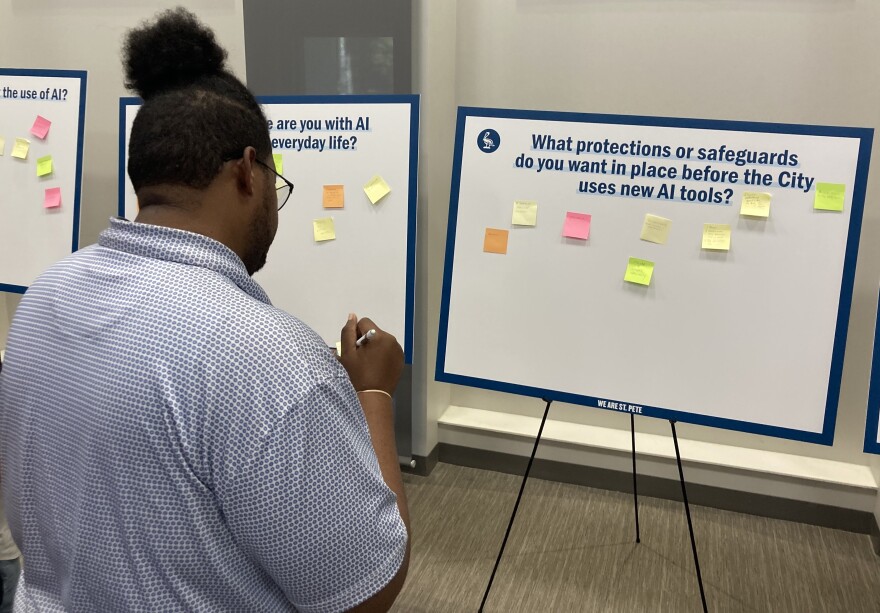 Man writes sticky notes