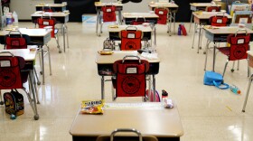 Desks are arranged in a classroom at an elementary school in Nesquehoning, Pa., March 11, 2021. (AP Photo/Matt Slocum)