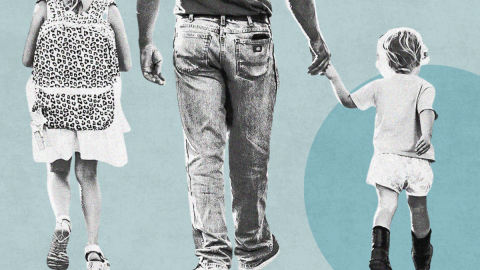 Kids hold hands with a parent 
