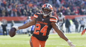 FILE - In this Nov. 11, 2018 file photo Cleveland Browns running back Nick Chubb celebrates after scoring a 92-yard touchdown in the second half of an NFL football game against the Atlanta Falcons in Cleveland. 