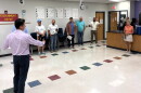 Principal Jacob Johnston (left) leads a tour through Christa McAuliffe K-8 Academy in southeast Wichita. The Wichita school district is hosting several tours at different school buildings this summer ahead of the November bond referendum.