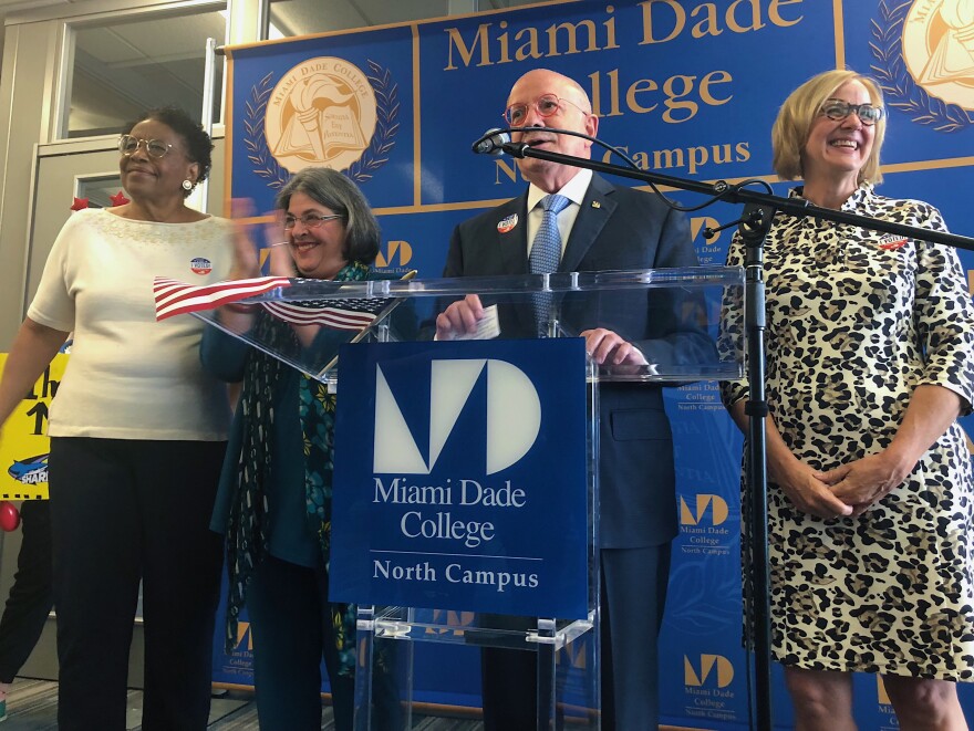 Miami Dade College president Eduardo PadrÃ³n and county commissioners celebrate the opening of early voting at the college's north campus on Oct. 22. Nearly 3,000 people had voted at that location as of Wednesday, Oct. 31. 