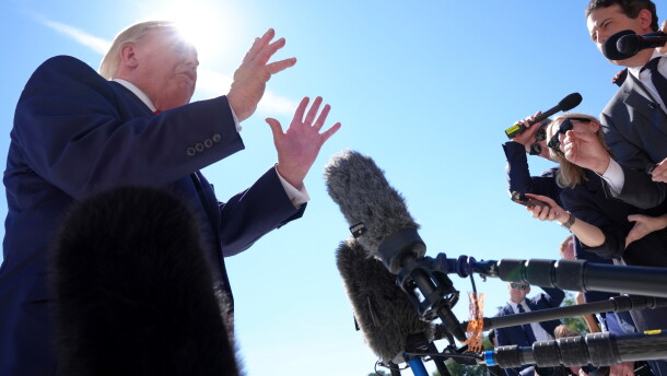 President Donald Trump speaks with reporters before boarding Marine One on the South Lawn of the White House, Thursday Oct. 1, 2026, in Washington. (AP Photo/Jacquelyn Martin)