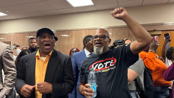 Protestors fill the halls in the Louisiana Legislature in Baton Rouge during a Senate committee hearing Friday, May 8, 2026 on redistricting. (AP Photo/Jack Brook)