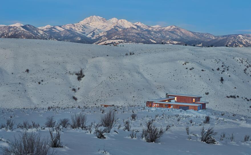 Studhorse. House set in the winter landscape.