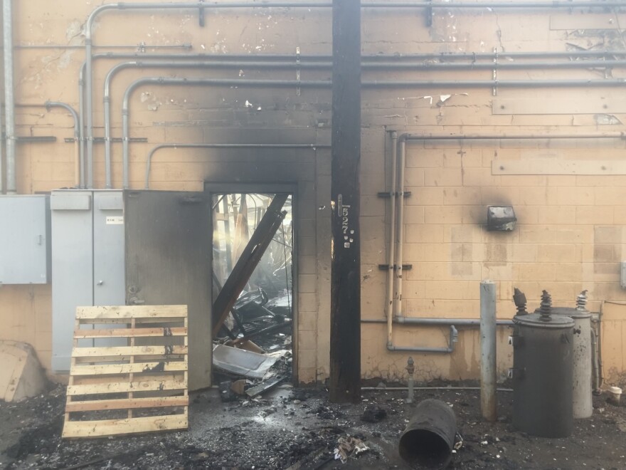 The destroyed Hartmann Brothers medical supply warehouse viewed from the alley on April 20, 2022.