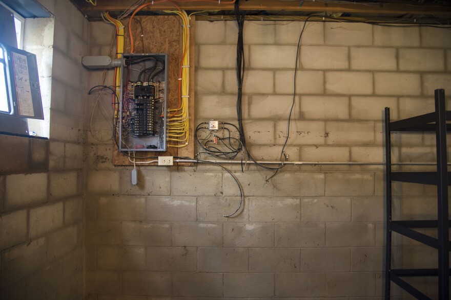 Grass marks the high-water line in Kim Harris’s basement Tueaday, Aug. 1, 2017 in Mannington, W.Va. The Harris's shut off their electric before water hit the breaker box.