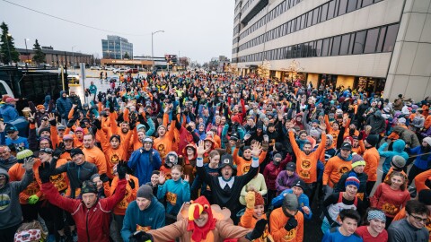 Participants in the Turkey Trot, many dressed as turkeys 