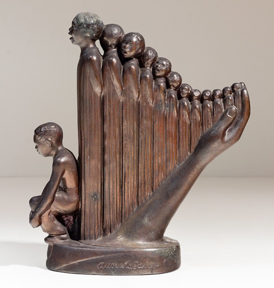 A souvenir version of Savage's 1939 sculpture <em></em><em>The Harp</em>, which was inspired by "Lift Every Voice and Sing."