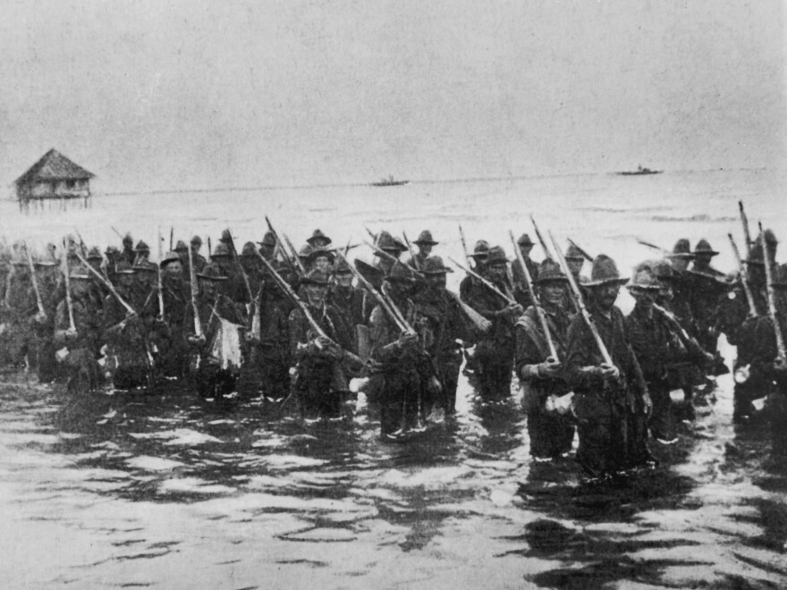 American troops advance along the seashore with support from the U.S. fleet (visible in the background) before an attack on Manila during the Spanish-American War in 1898. American proponents of expansion celebrated the influx of new people and the importing of "modern" ideas, institutions and influences to the Philippines.