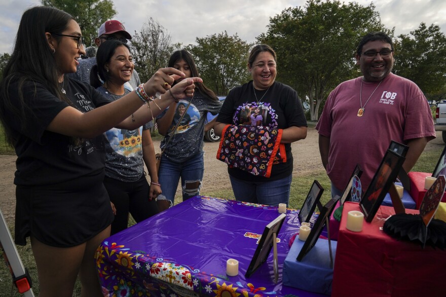 Faith Mata, left, remembers her sister Tess M. Mata along with Lexie's family, in gray t-shirts, and her parents Veronica and Jerry Mata.