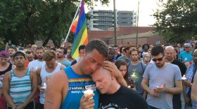 Photo: Ryan Gibson (l) and Tabor Winstead at a vigil in downtown Raleigh on Sunday night