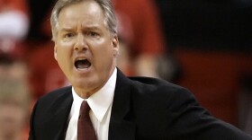 Nebraska head coach Barry Collier disputing a referee's call in a college basketball game against Texas Tech, in Lincoln, Neb., Feb. 18, 2006. Collier will be retiring at the end of April 2024, the department has announced. The 69-year-old returned to alma mater in August 2006 and presided over the Bulldogs memorable national runner-up finishes in 2010 and 2011.