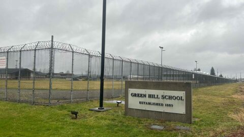 A sign and fence at the Green Hill School for juvenile offenders, in Chehalis, Washington.