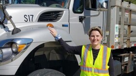Lisa Paul with a garbage truck