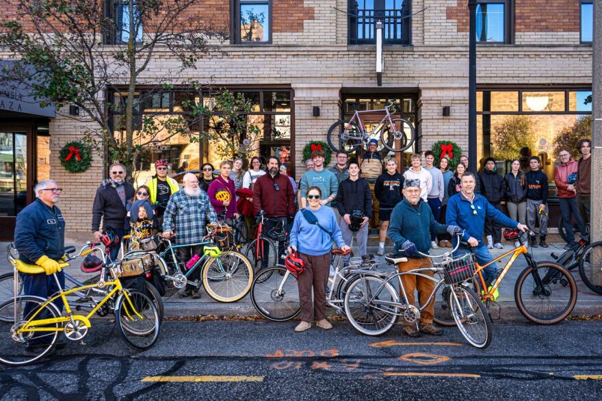 Members of the Open Roads Project participating in a bike "flash mob." Amelia Katanski is in the center in a blue sweater.