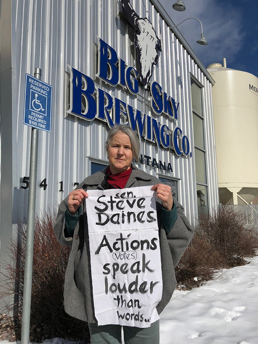 Teresa Jacobs stands outside of Big Sky Brewery in Missoula, February 21, 2018. Jacobs hoped to talk with Senator Steve Daines during his visit, but was frustrated when he left ahead of schedule without taking questions.