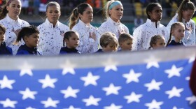 U.S. team sing their national anthem ahead of play in the Women's World Cup Group E soccer match between the United States and the Netherlands in Wellington, New Zealand, Thursday, July 27, 2023. (AP Photo/John Cowpland)