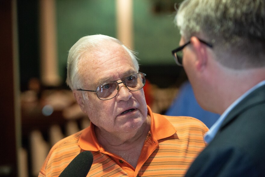 Ron Schaefer, left, speaks with Chemours Plant Manager Brian Long, right, prior to the start of a community meeting hosted by Chemours at Faith Tabernacle Christian Center in St. Pauls, N.C. on Tuesday, June 12, 2018. The company invited the public to the