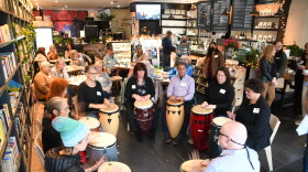 Sam Holmstock leads the Creative Exchange Meetup "Drumming Through Trauma" in Hyannis.